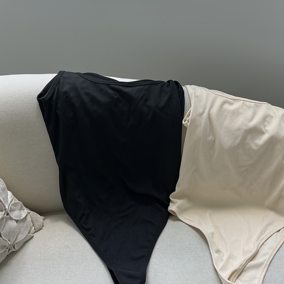 2 size medium bodysuits black and ivory never worn. Price for both bodysuits.NWT - Picture 3 of 4